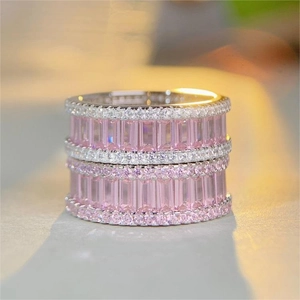 Macro detail of S925 sterling silver ring with rectangular pink carbon diamonds in setting