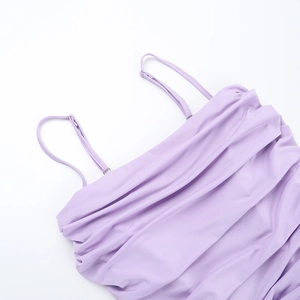 Detail of light purple dress showing thin straps and ruffled pleated bust texture