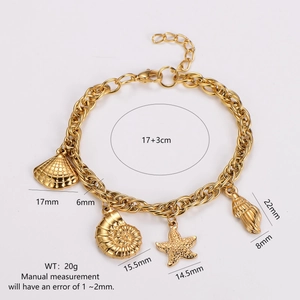 Gold stainless steel ocean charm bracelet featuring starfish and shell pendants