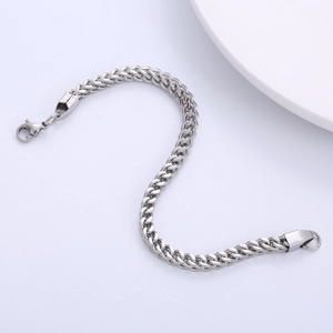 Polished 5mm silver stainless steel Spiga chain bracelet with a secure lobster clasp