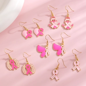 Ohrhänger mit rosa Schleife gegen Brustkrebs aus Goldmetall und rosa Emaille