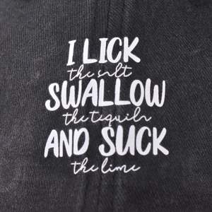 Black washed cotton baseball cap featuring white tequila drinking instructions print