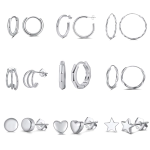 Collection of nine S925 sterling silver minimalist stud earrings and hoop designs