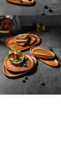 Macro detail of irregular wooden serving tray set with natural walnut grain texture