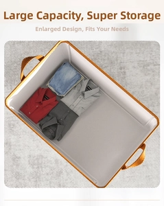 Polyester-cotton closet organizer with orange leather handles and large storage space