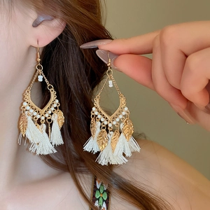 Bohemian leaf tassel drop earrings in gold and white with vintage ethnic style hook