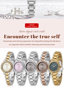 Detailed display of luxury gold and silver steel watches with crystal bezels and dials