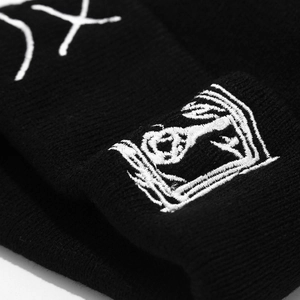 Black knitted beanie hat with white face embroidery for winter outdoor warmth