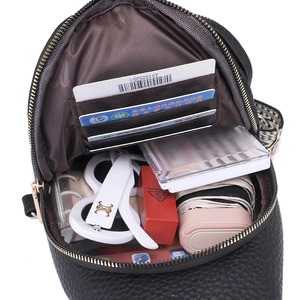 Versatile black PU leather chest bag with multi-layer interior for large capacity storage