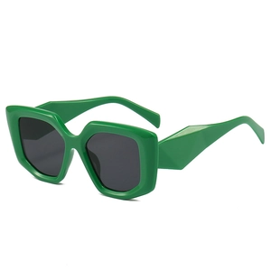Bright green chunky oversized geometric sunglasses with dark lenses for fashion street style