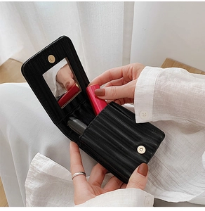 Black PU leather mini lipstick case with built-in mirror and magnetic closure detail