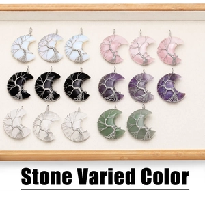 Detailed handcrafted silver wire tree of life wrapped moon crescent stone pendants