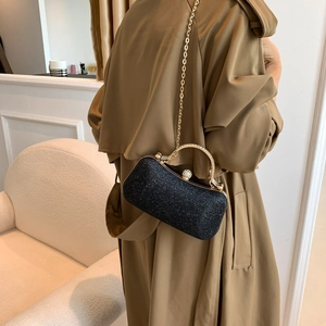 Elegant black glitter evening clutch with pearl clasp and golden chain for women