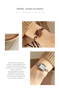 Detail of square quartz watch with hollow link chain strap and rose gold finish