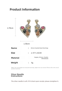 Detail view of heart crystal earrings with dimensions 2.70cm height and 1.50cm width