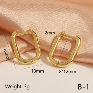 Macro shot showing dimensions of a 18K gold plated geometric U-shaped chunky earring