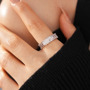 Detailed close-up of a silver ring featuring marquise and round-cut cubic zirconia stones