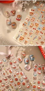Macro detail of cute rabbit nail art stickers with festive New Year elements and texture