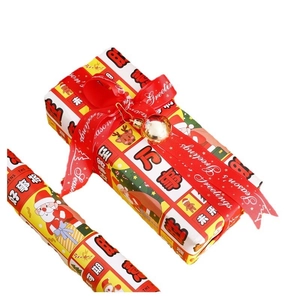 Christmas gift wrapping paper with festive red design and Season's Greetings ribbon