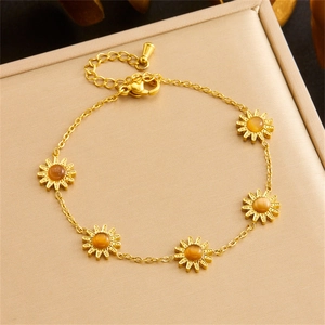 Golden stainless steel bracelet with five sunflower charms and tiger eye stone inlay