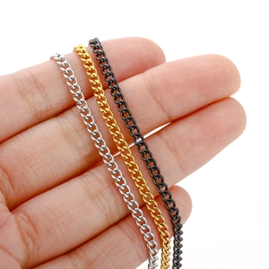 Detailed view of stainless steel twist chains in silver, gold, and gunmetal finishes