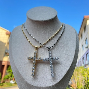 Hip hop style gold and silver cross necklaces with iced out zircon stones on white models