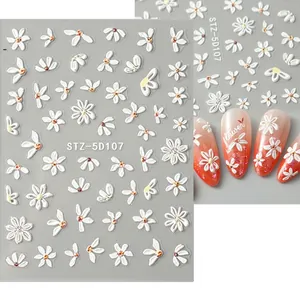 Detailed 5D embossed nail art stickers with white daisies and 3D textured flower patterns