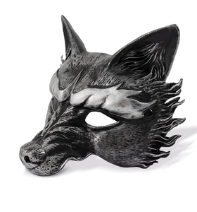 Macro view of vintage wolf mask with silver metallic hair texture and half-face details