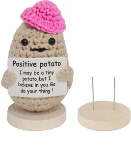 Handmade crochet positive potato doll with pink heart hat and stable wooden base