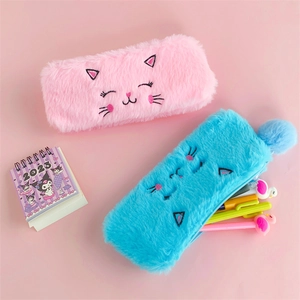 Close-up of pink and blue plush cat pencil cases with soft fur and embroidered details