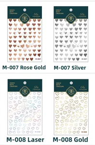 Vue détaillée d'autocollants pour ongles cœur en or rose, argent, holographique et doré