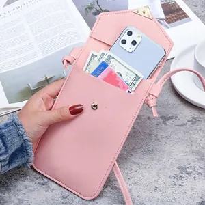 Pink minimalist crossbody phone bag with touchscreen window, card slots and gold trim