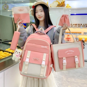 5-piece pink and white school backpack set with tote, drawstring bag, and plush charm