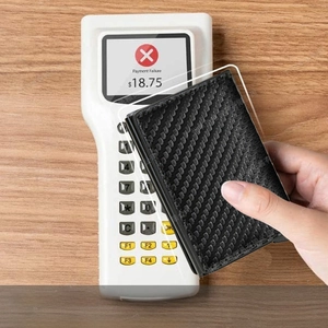 RFID blocking carbon fiber card holder preventing unauthorized payment on POS terminals