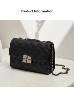 Detail of black quilted leather shoulder bag with silver square clasp and chain strap