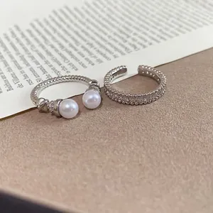 Elegant silver open ring with pearls and zircon stone band in a minimalist Korean style