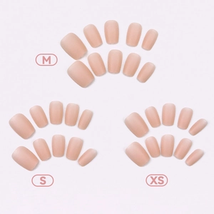 Matte nude pink press-on nails in XS, S, M sizes with a natural square oval shape
