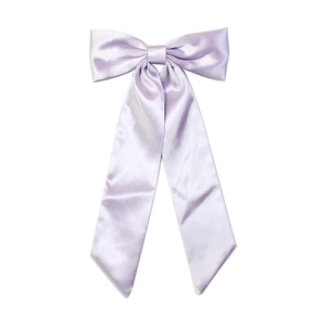 Elegant light purple satin bow hair clip with long ribbons on a clean white backdrop