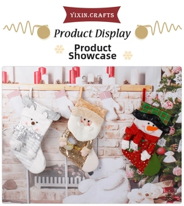 Detailed view of three knitted Christmas stockings with reindeer, Santa, and snowman designs