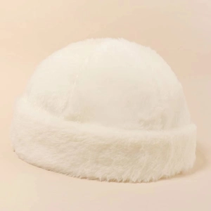 Detail shot of the white plush faux fur docker hat with thick brim for winter warmth