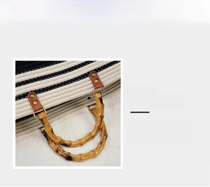 Detail of woven tote bag featuring bamboo handle with leather and metal rivets