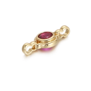 Detail of golden jewelry connector with red round gemstone for DIY necklace bracelet