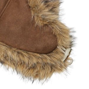 Macro shot of faux suede winter hat fabric with plush brown faux fox fur trim detail