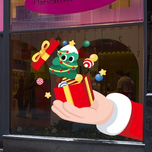 Christmas window sticker featuring Santa Claus holding a gift box and a festive tree