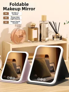 Close-up of portable LED vanity mirror showing three-color lighting and smart touch control