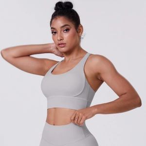 Detail of light gray brushed yoga set featuring seamless high-waist fit and soft matte fabric