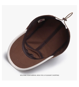 Détail de la doublure intérieure et du cordon de réglage de la casquette marron