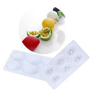 Detailed white silicone mold for creating passion fruit and strawberry shaped desserts