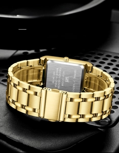 Detailed macro view of the gold stainless steel watch back and 3ATM waterproof engraving