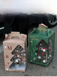 Detail of Christmas tree gift box with transparent window and sturdy handle